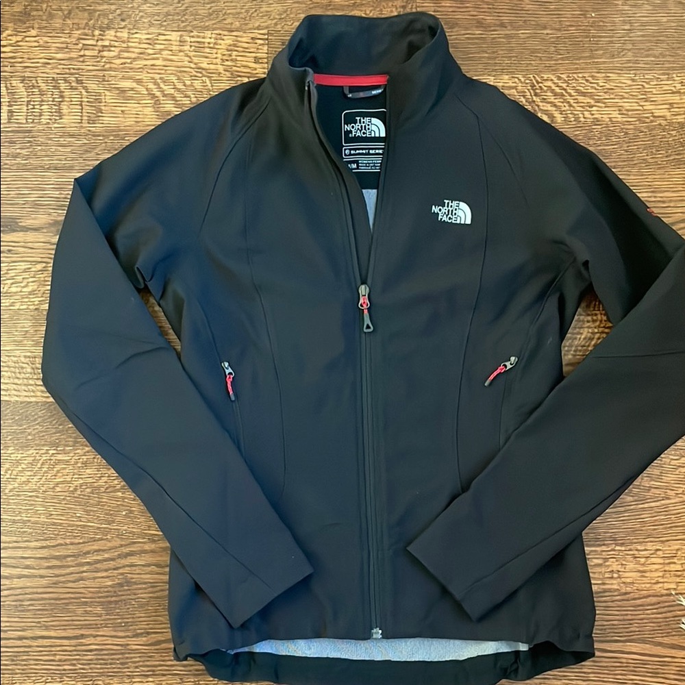 The North Face Black Softshell Jacket with Red Zipper Pulls